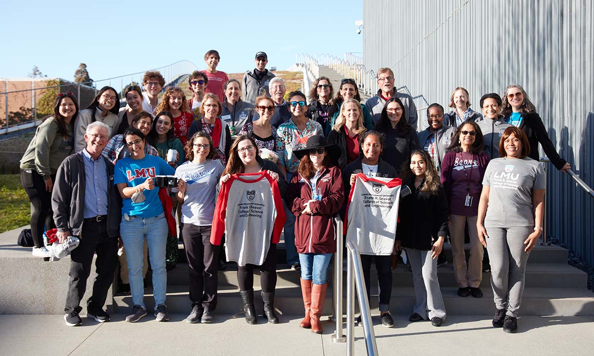 Group photo of faculty and staff outside